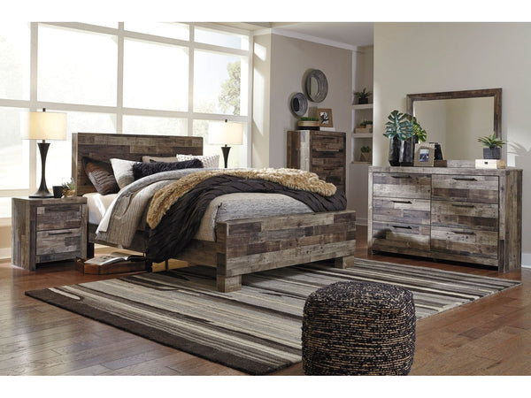 Ashley Derekson bedroom suite in a room setting