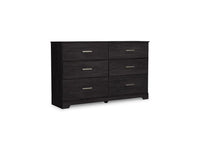 Ashley Belachime six-drawer dresser on a white background