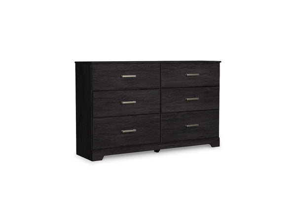 Ashley Belachime six-drawer dresser on a white background