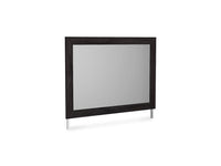 Large Ashley Belachime mirror with a dark wooden frame on a white background
