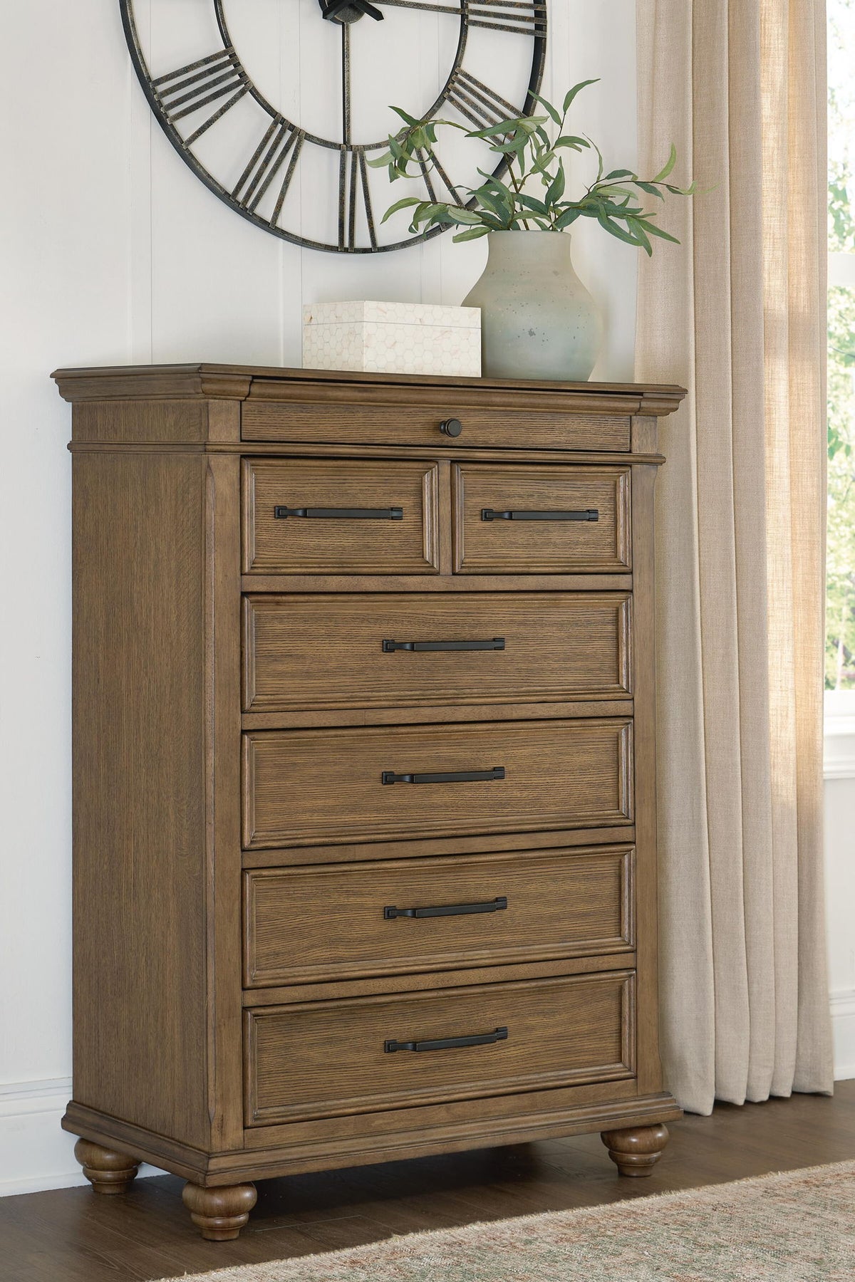 Karallin - Seven Drawer Chest - Medium Brown